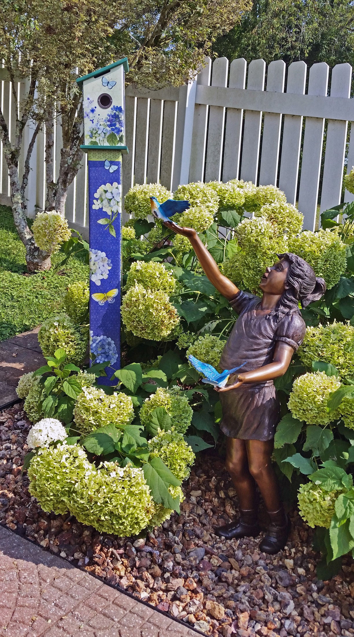 Girl, sandy, with two Blue birds Bronze Statue - Size: 25"L x 23"W x 41"H.
