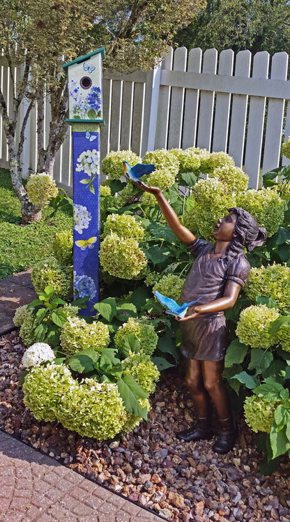 Girl, sandy, with two Blue birds Bronze Statue - Size: 25"L x 23"W x 41"H.