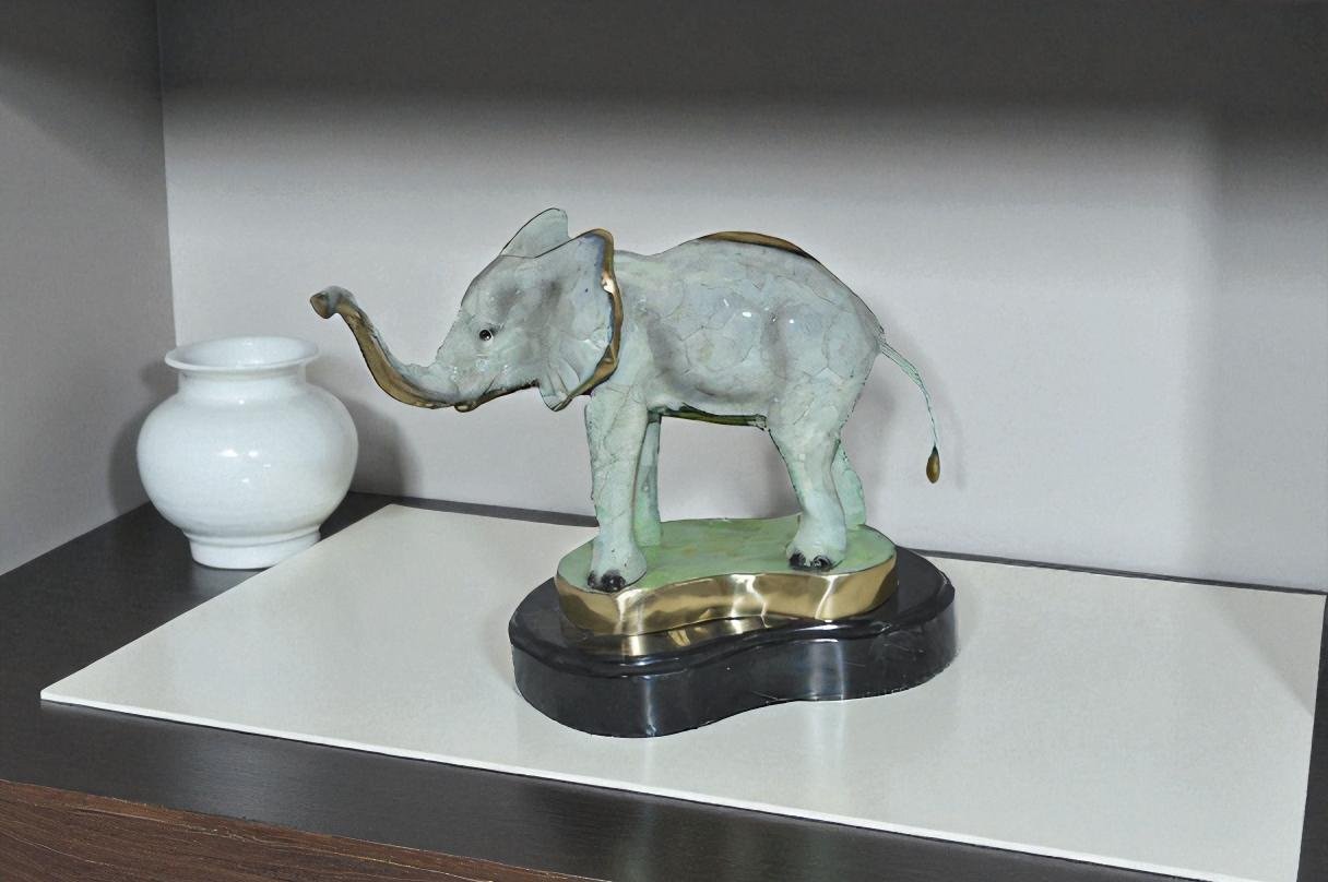 Elephant trunk Up Bronze Statue -  Size: 16"L x 9"W x 10"H.