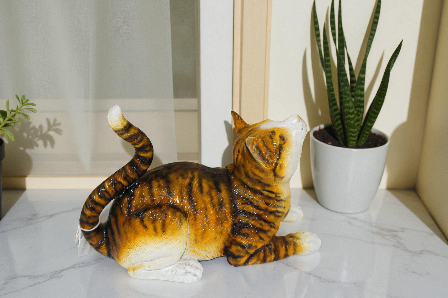 Squat cat Bronze Statue -  Size: 12"L x 6"W x 9"H.