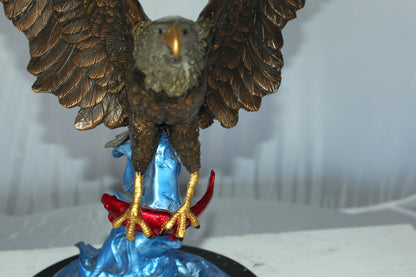 Eagle Catching his Prey Bronze Statue -  Size: 17"L x 20"W x 25"H.