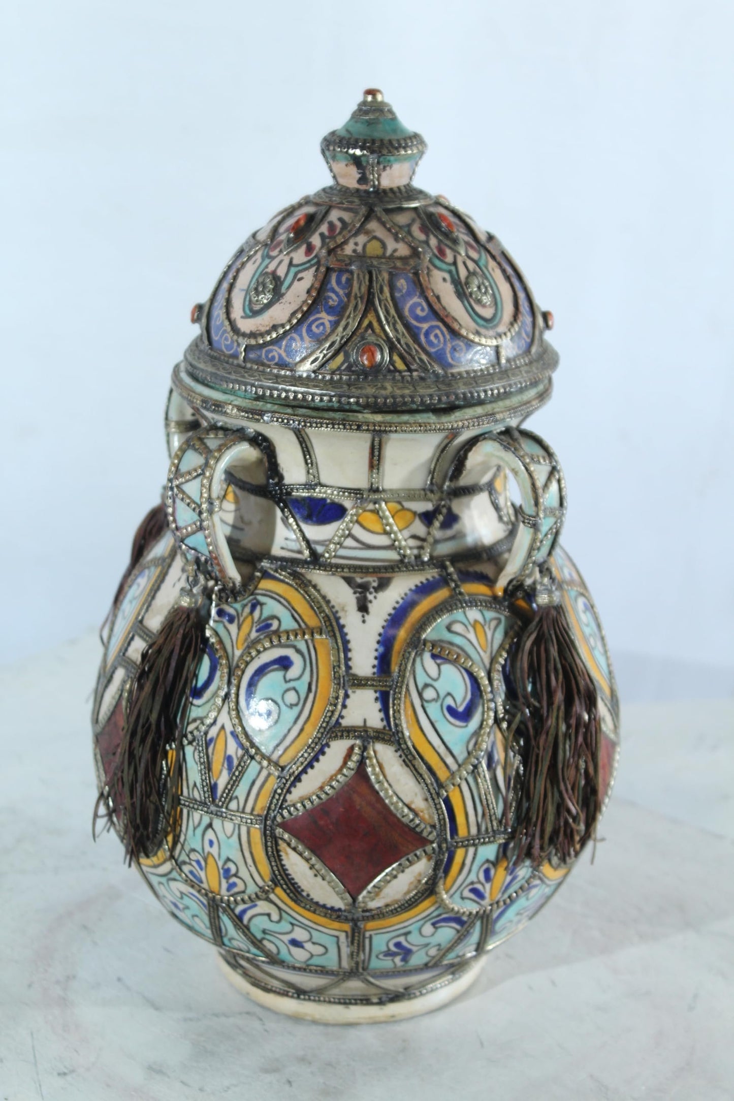 Handcrafted Ceramic Lidded Jar with Tassels and Metal Inlay 10" x 10" x 18"H