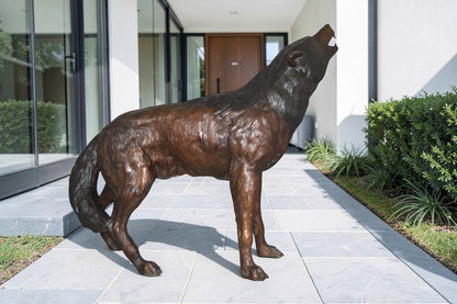 Howling Wolf Bronze Statue -  Size: 40"L x 10"W x 32"H.