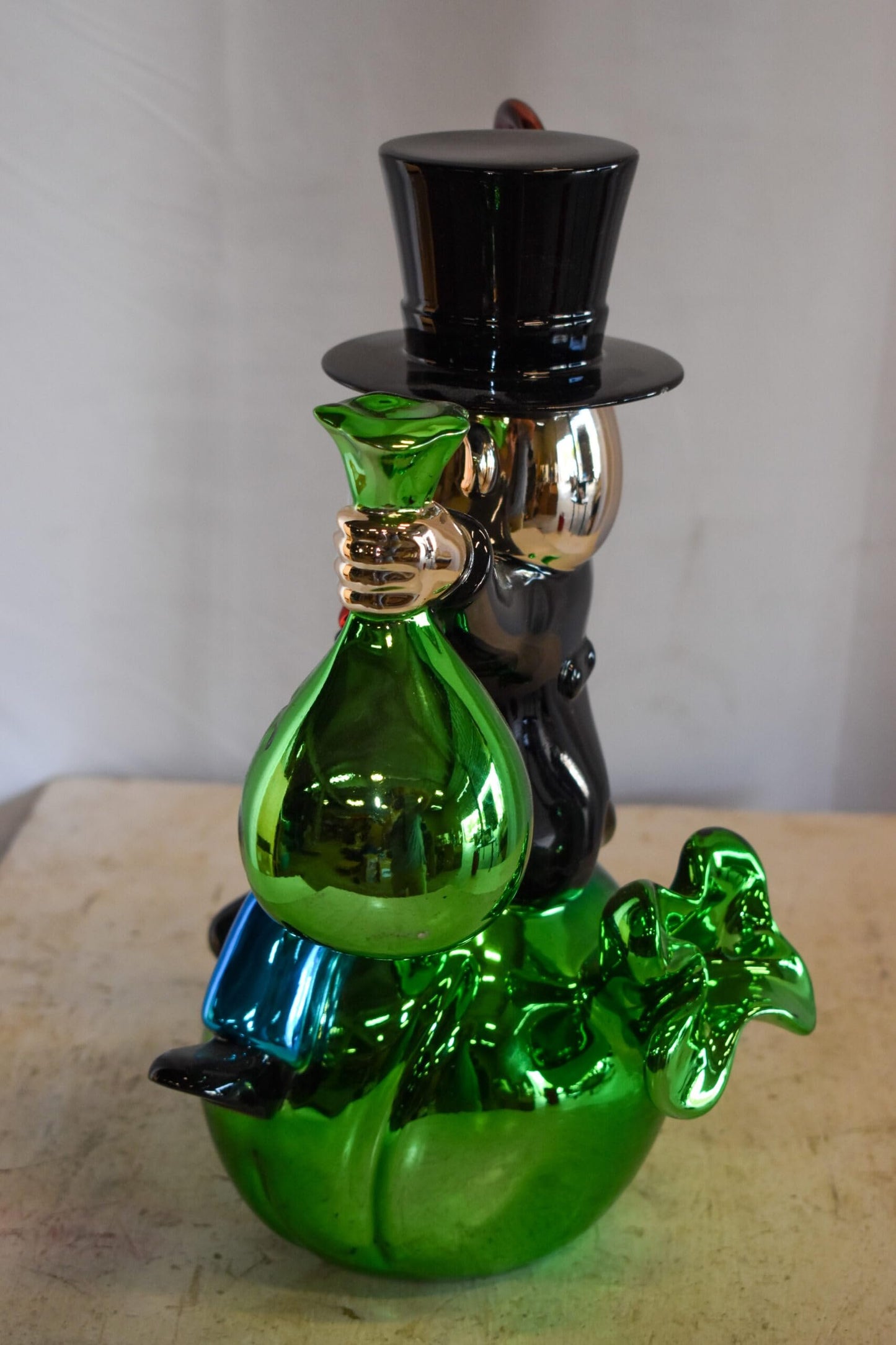 Joyous Monopoly Man Sitting on Money Bag Resin Statue 12" x 10" x 16"H