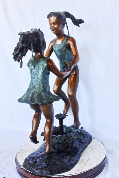 Young dancing girls circling fountain bronze statue -  Size: 14" x 29" x 38"H.