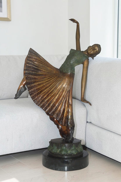 Beautiful Dancer Performing Bronze Statue -  Size: 27"L x 12"W x 48"H.