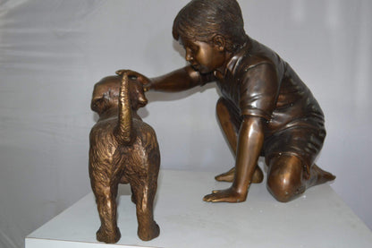 Boy and Dog Bronze Statue - Size: 30"L x 18"W x 18"H.