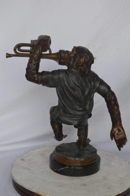 Monkey With Trumpet Bronze Statue - Size: 24"L x 12"W x 26"H.