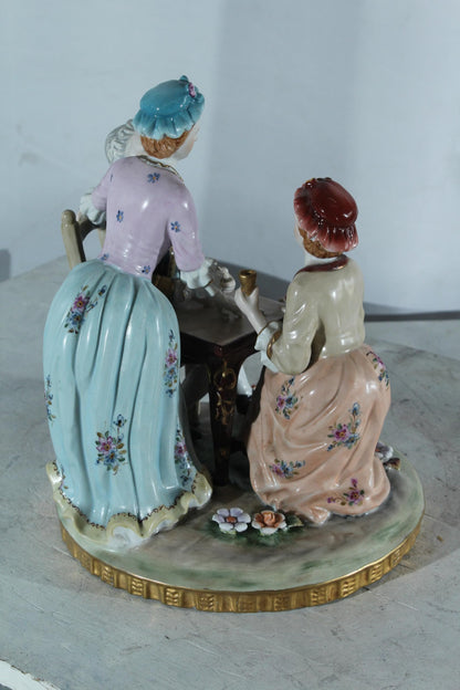 NIFAO Porcelain Figurine Group at Table with Cups 10"x10"x13"H