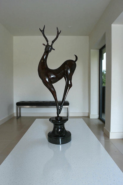 Deer standing Bronze Statue -  Size: 12"L x 7"W x 30"H.