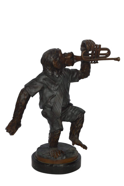 Monkey With Trumpet Bronze Statue - Size: 24"L x 12"W x 26"H.