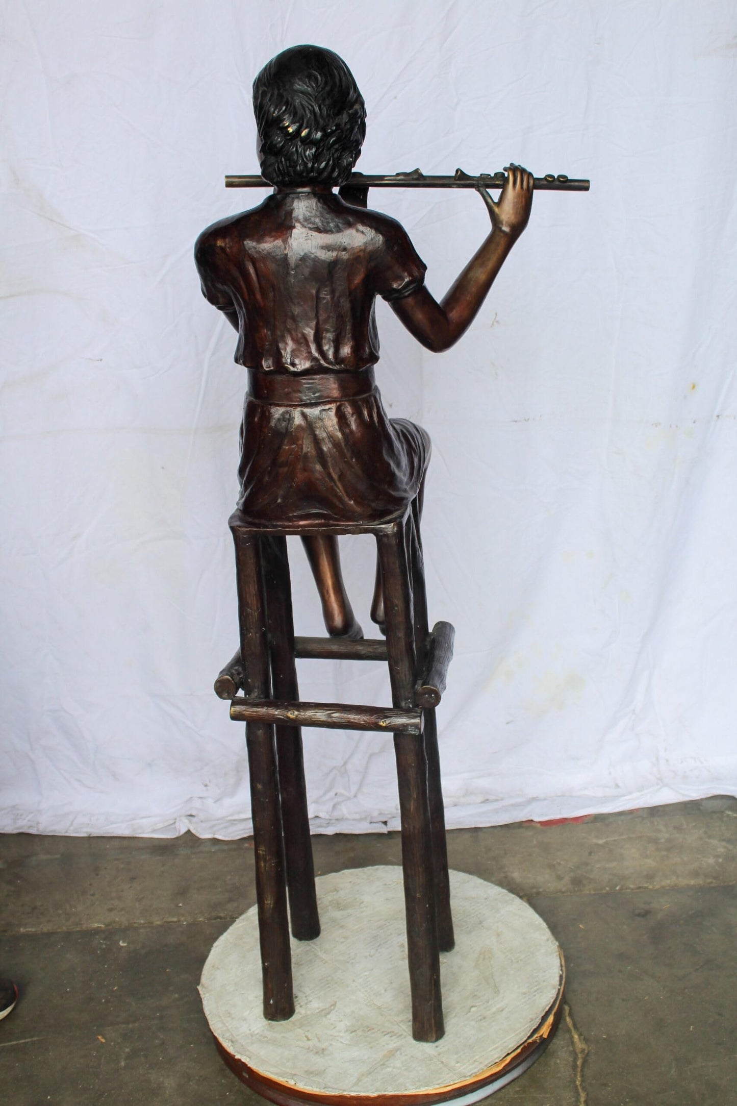 Young Girl Playing the Flute sitting on a Chair Bronze Statue 24" x 16" x 58"H