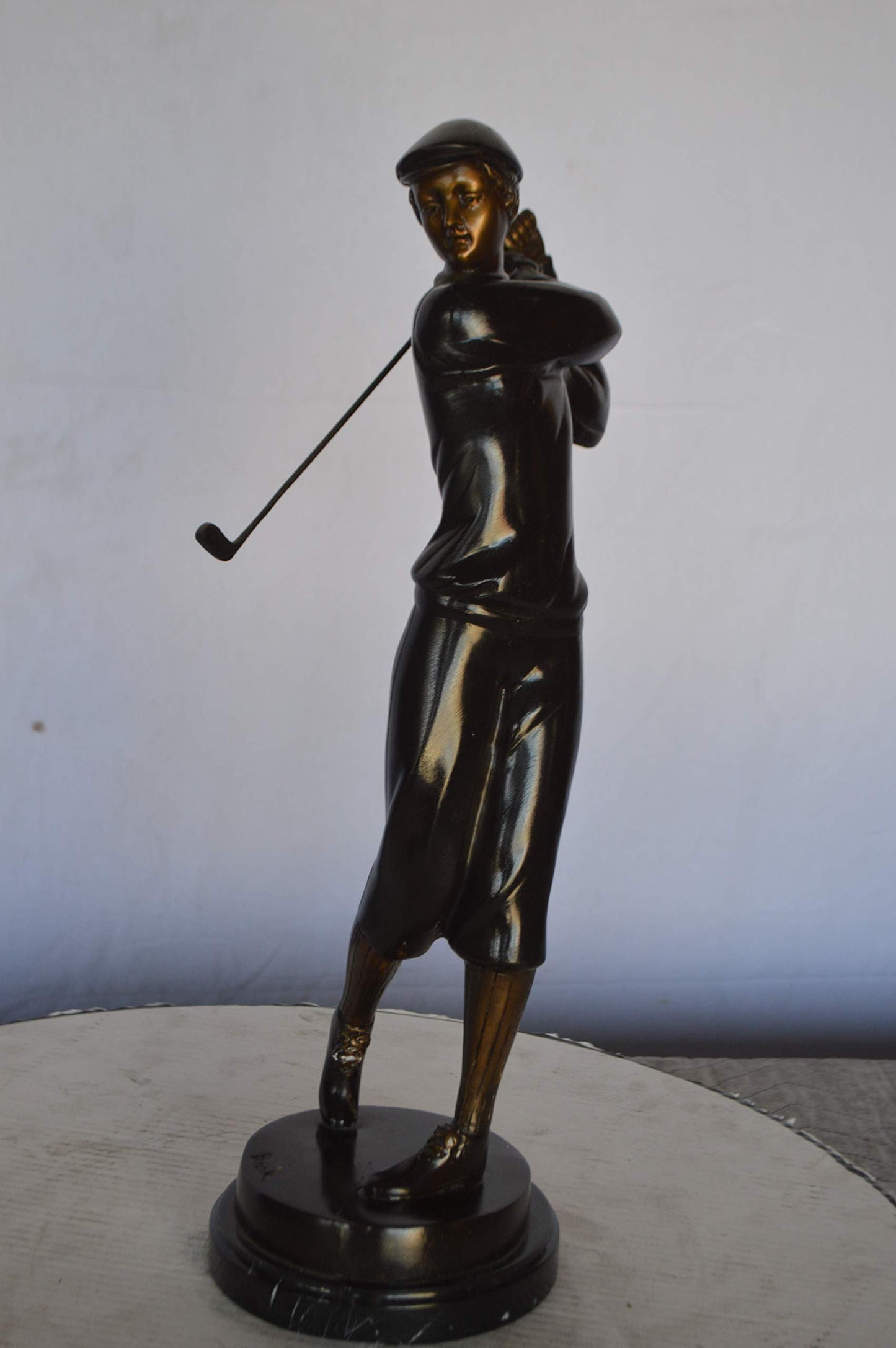Young Golfer Bronze Statue mounted on a Marble Base -  Size: 8"L x 6"W x 19"H.