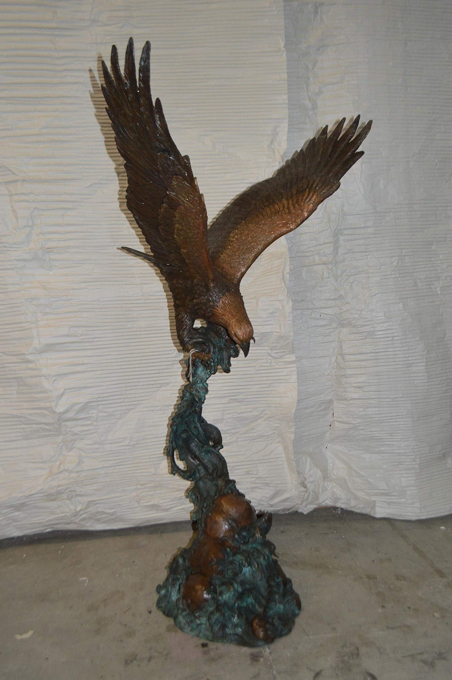 Flying Eagle on Wave Bronze Statue -  Size: 25"L x 35"W x 57"H.