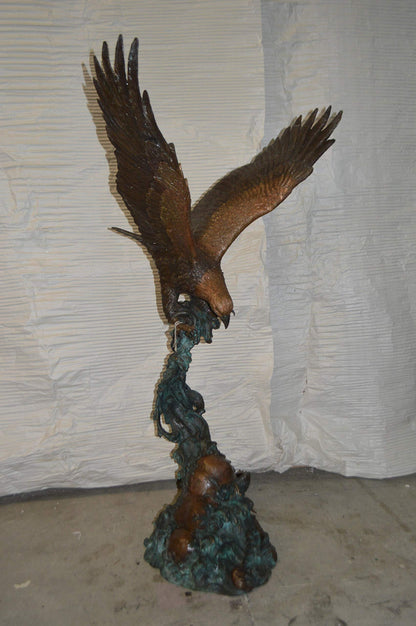 Flying Eagle on Wave Bronze Statue -  Size: 25"L x 35"W x 57"H.
