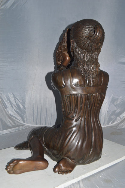 Girl Playing With Her Little Dog Bronze Statue -  Size: 22"L x 22"W x 30"H.
