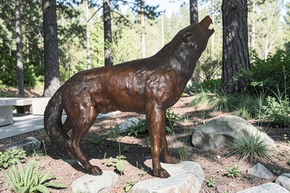 Howling Wolf Bronze Statue -  Size: 40"L x 10"W x 32"H.