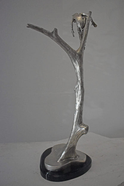 Monkey Resting on a Tree Silver Finish Bronze Statue - Size: 12" x 13" x 27"H.