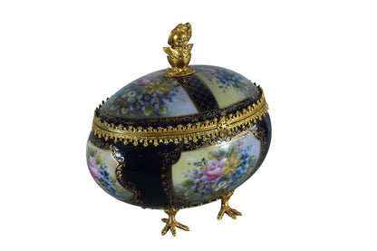 NIFAO Porcelain floral egg shaped lidded box with cherub and chicken feet 11"x8"x12"H
