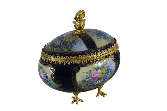 NIFAO Porcelain floral egg shaped lidded box with cherub and chicken feet 11"x8"x12"H