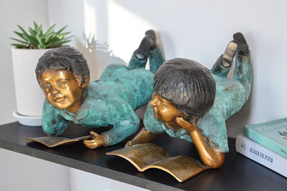 Set of a Boy and a Girl Reading a Book Bronze Statue -  Size: 16"L x 7"W x 8"H.