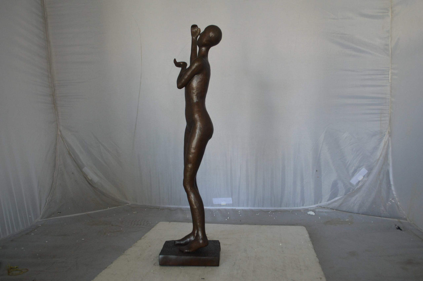 Abstract of Art nude lady lifting hand bronze statue - Size: 9"L x 6"W x 25"H.