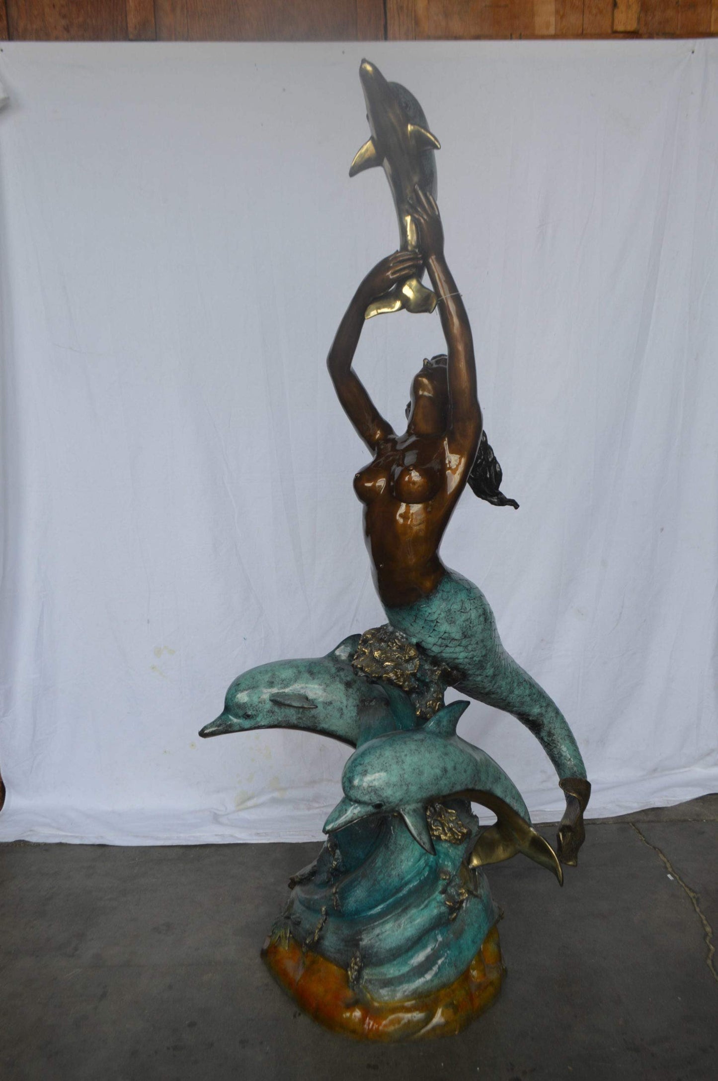Mermaid and Three dolphins fountain bronze statue - Size: 34"L x 41"W x 83"H.