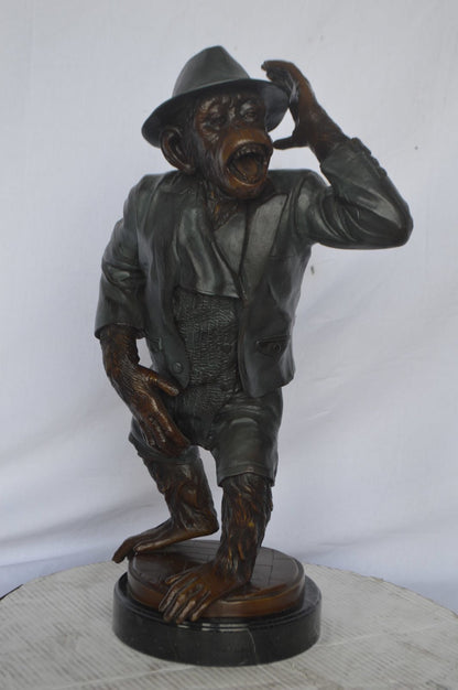 Monkey in Suit bronze statue - Size: 16"L x 10"W x 27"H.