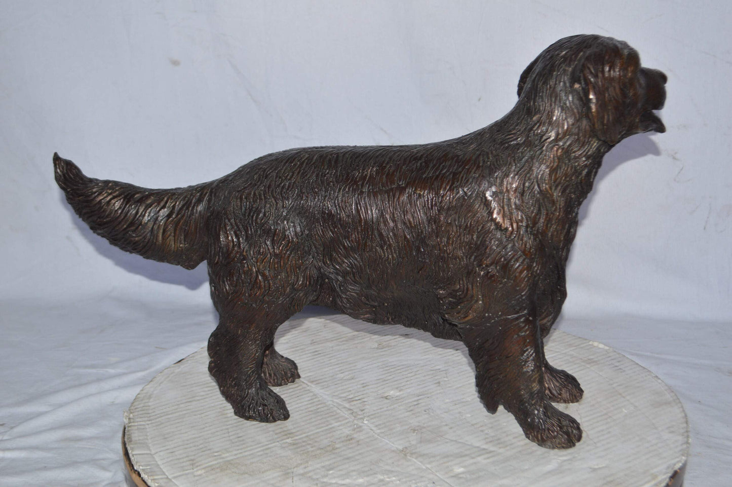 Golden Retriever dog bronze statue - Size: 26"L x 7"W x 16"H.