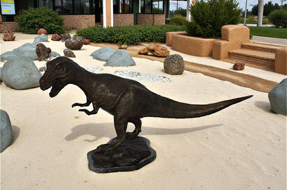 Tyrannosaurus Rex Dinosaur Bronze Statue -  Size: 31"L x 12"W x 15"H.