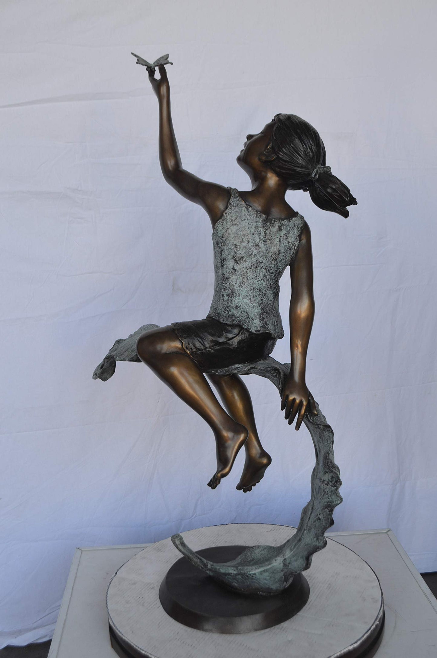 Girl on A Leaf Playing with Butterfly Bronze State -  Size: 27"L x 15"W x 45"H.