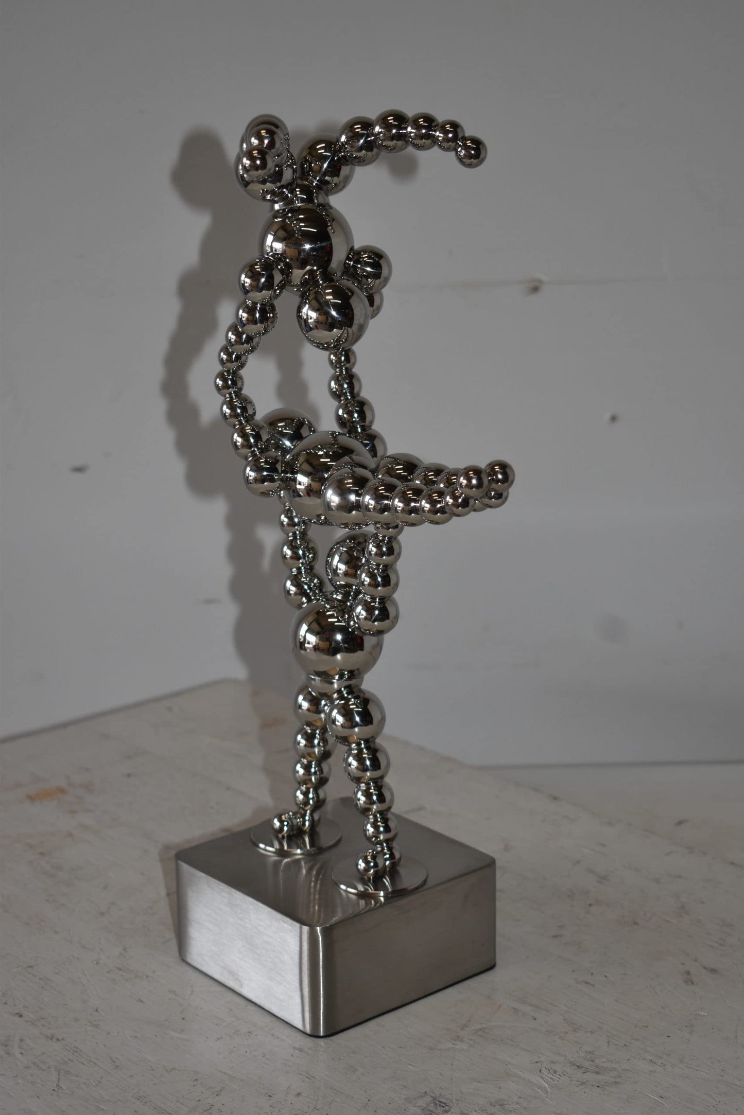 Modern Art of Acrobat Couple in Action Chrome Balls Statue Size: 6" x 8" x 18"H