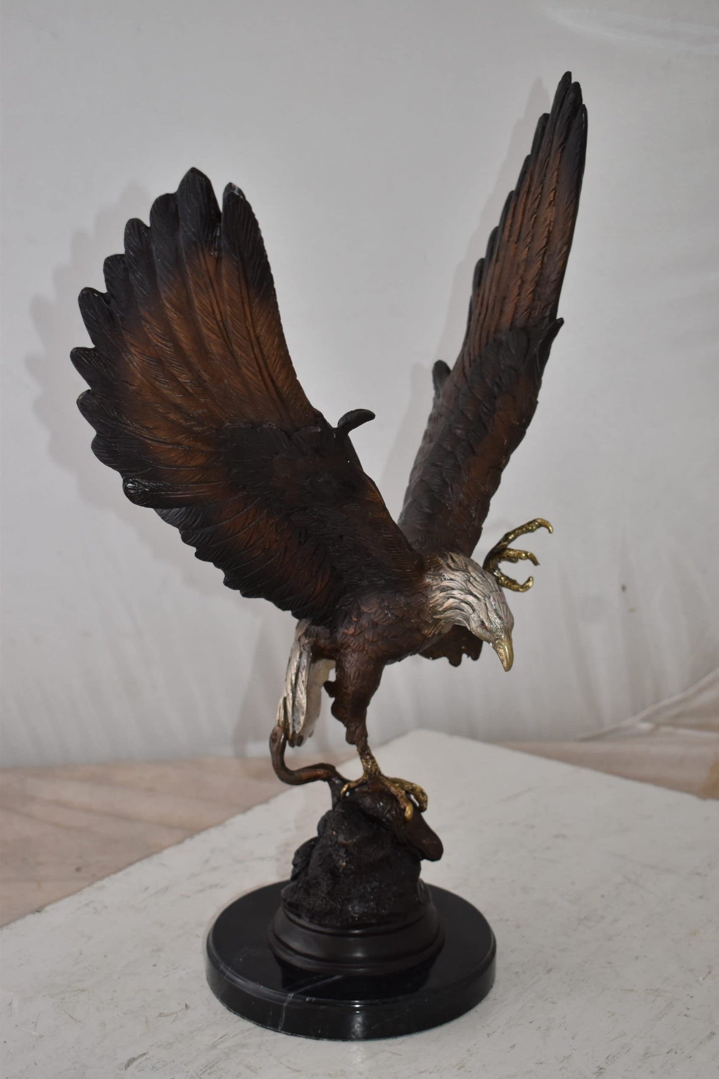 Eagle In Action Trying to Catch His Prey Bronze Statue Size: 17" x 10" x 23"H