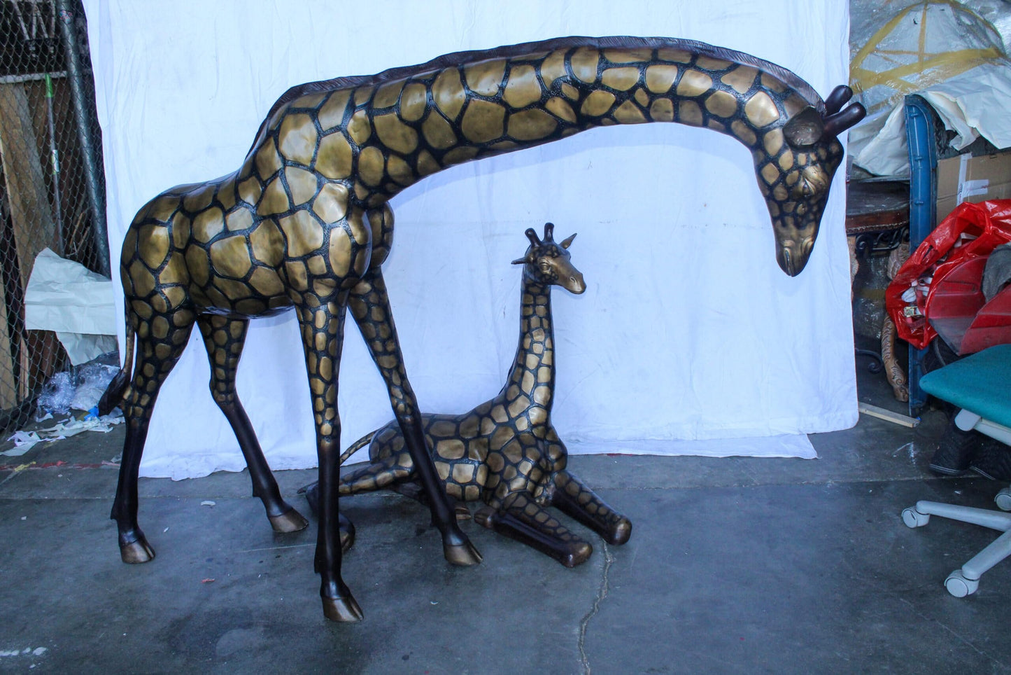 Life Size Bronze Giraffes Statues, One Laying, One Standing 77" x 21" x 58"H
