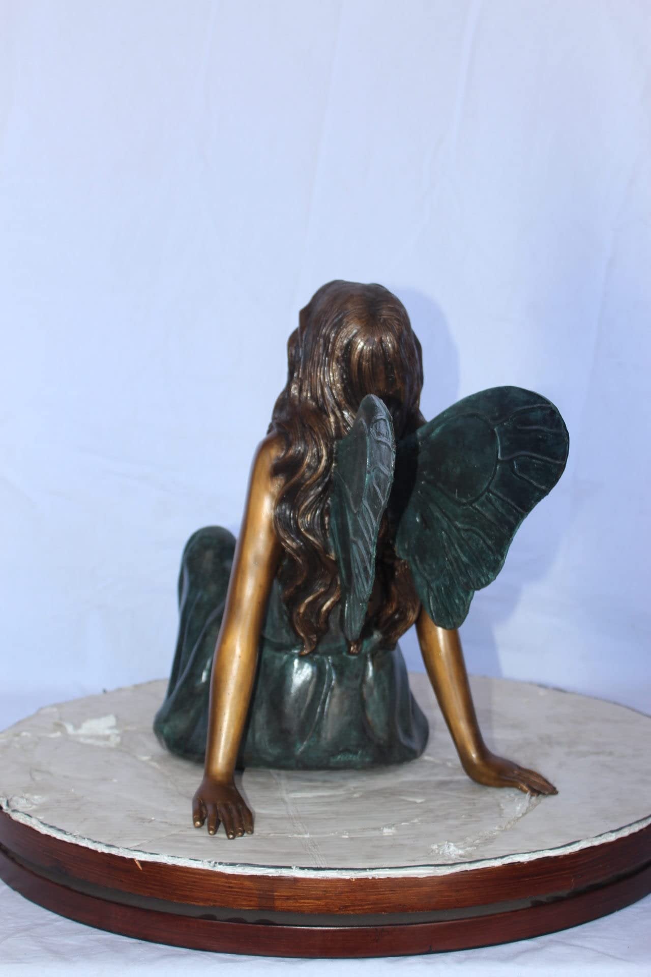 Fairy angel sitting peacefully bronze statue -  Size: 27"L x 12"W x 16"H.
