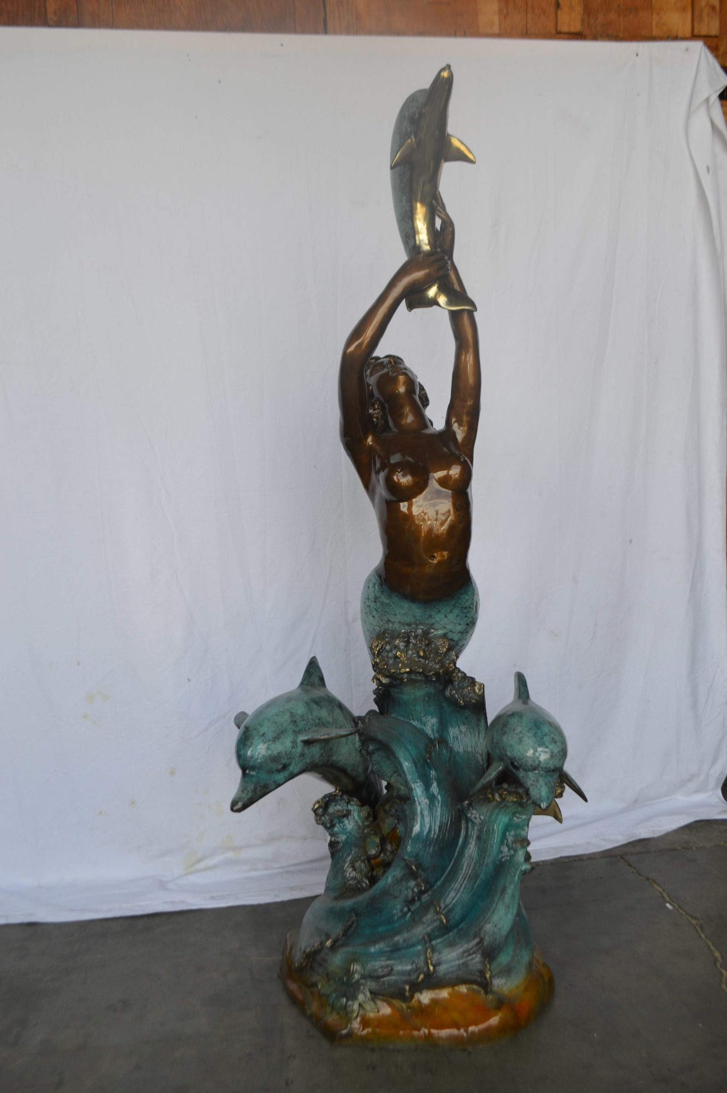 Mermaid and Three dolphins fountain bronze statue - Size: 34"L x 41"W x 83"H.