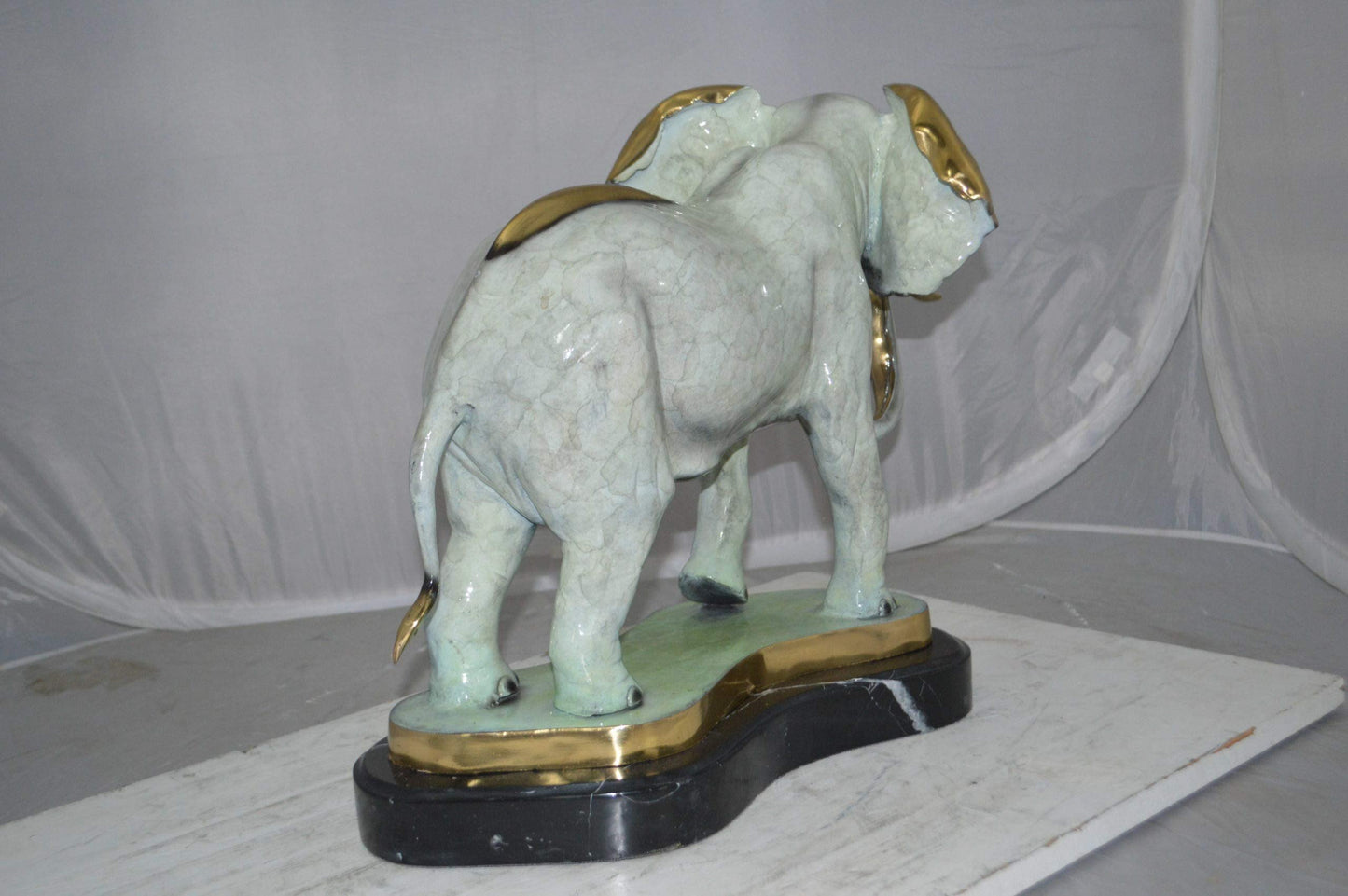 Elephant trunk Down Bronze Statue -  Size: 28"L x 12"W x 17"H.