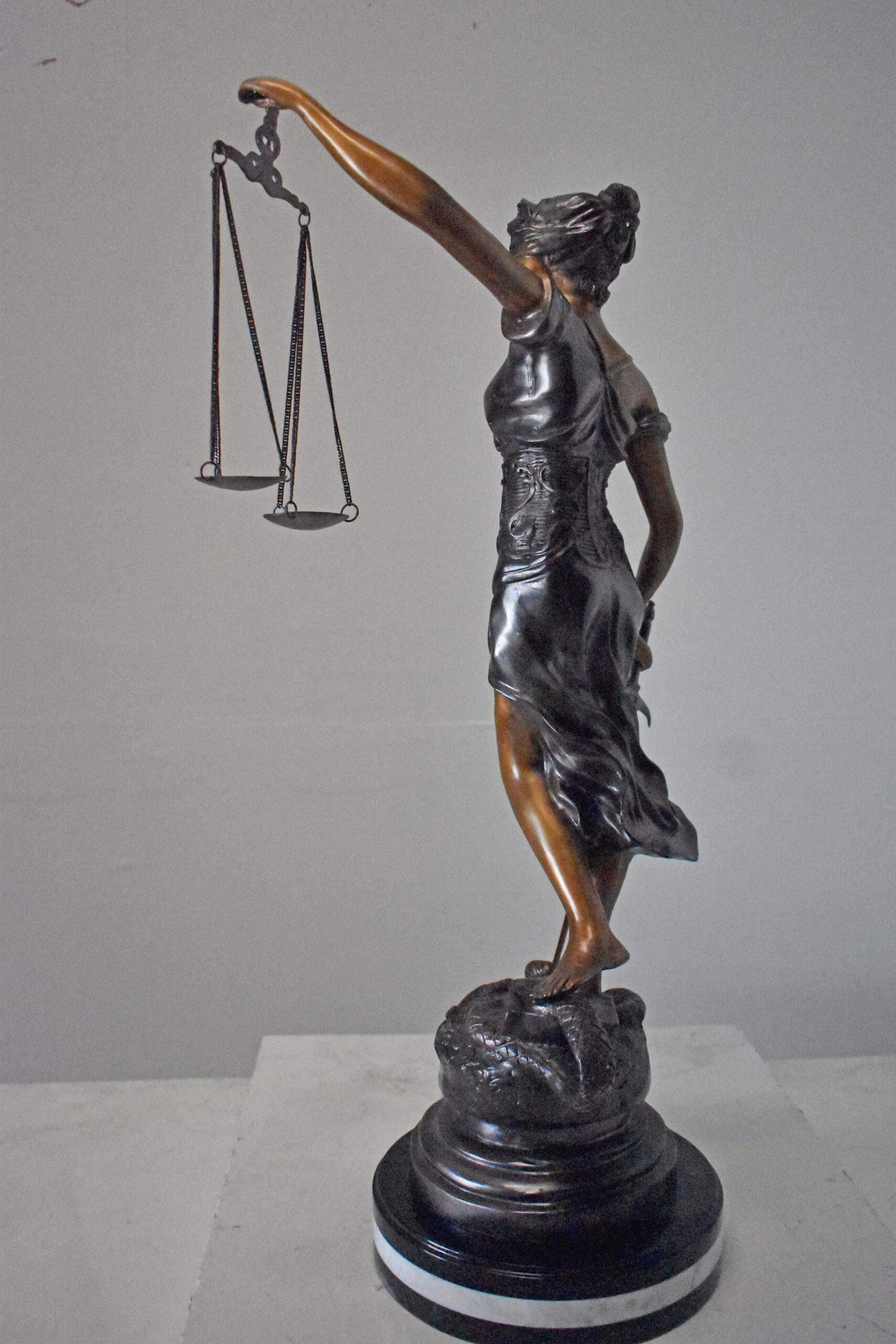Lady Justice bronze statue mounted on a marble - Size: 14"L x 16"W x 32"H.