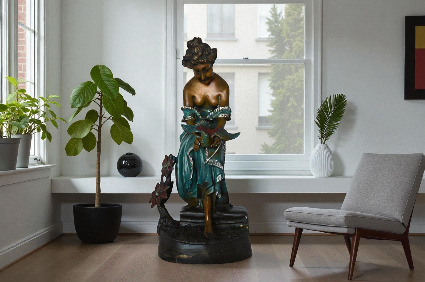 Lady holding a bird bronze statue - Size: 10"L x 9"W x 20"H.