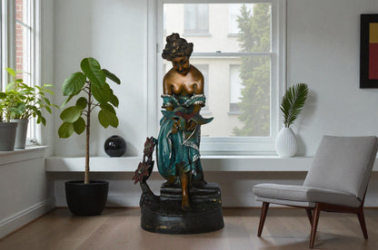 Lady holding a bird bronze statue - Size: 10"L x 9"W x 20"H.