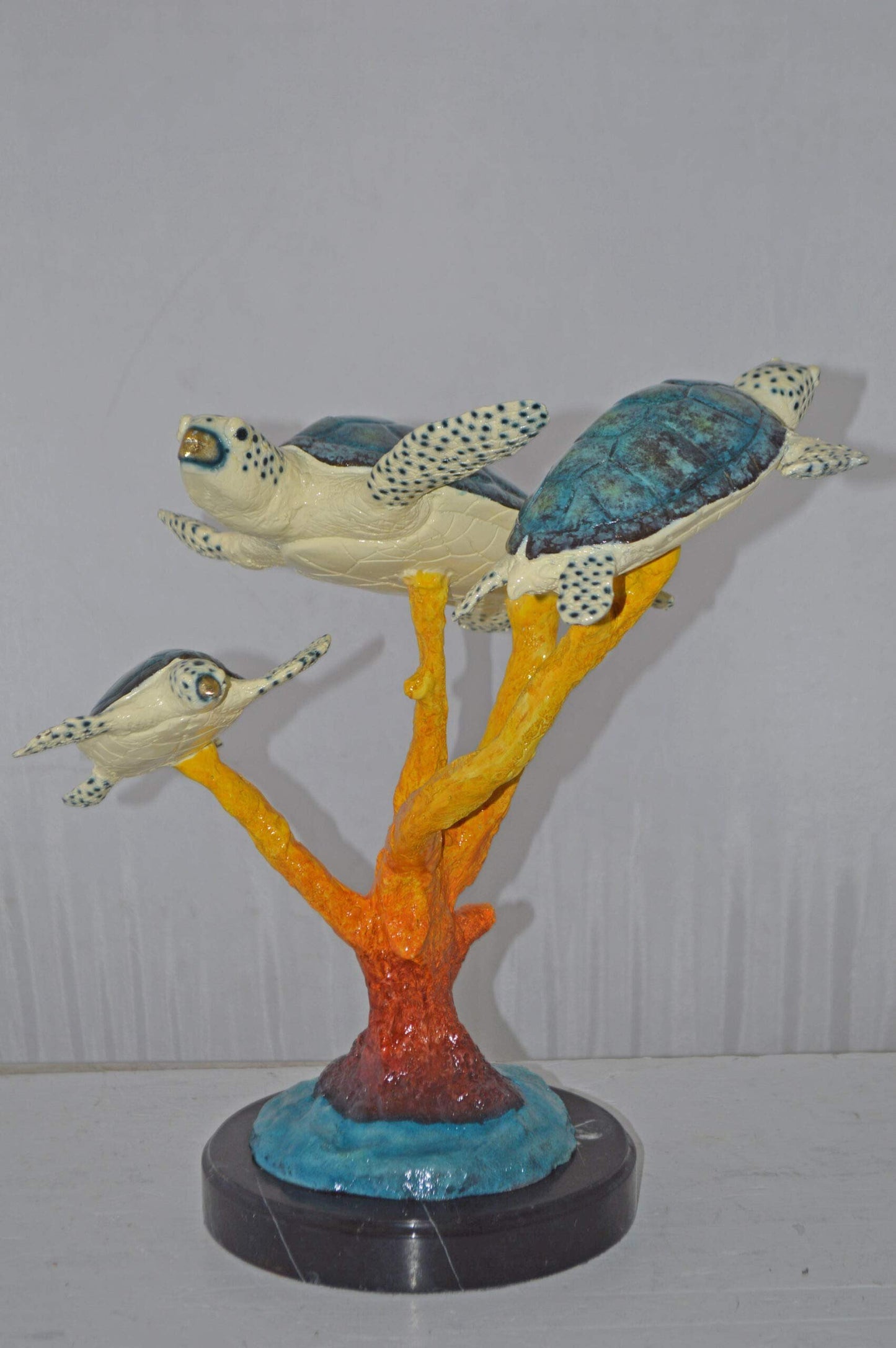 Three Turtles swimming around Corals Bronze Statue - Size: 17"L x 15"W x 19"H.