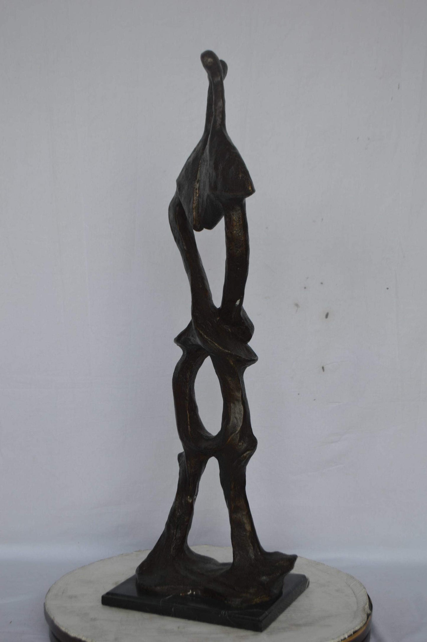 Modern art abstract, a couple kissing bronze statue - Size: 13"L x 11"W x 40"H.