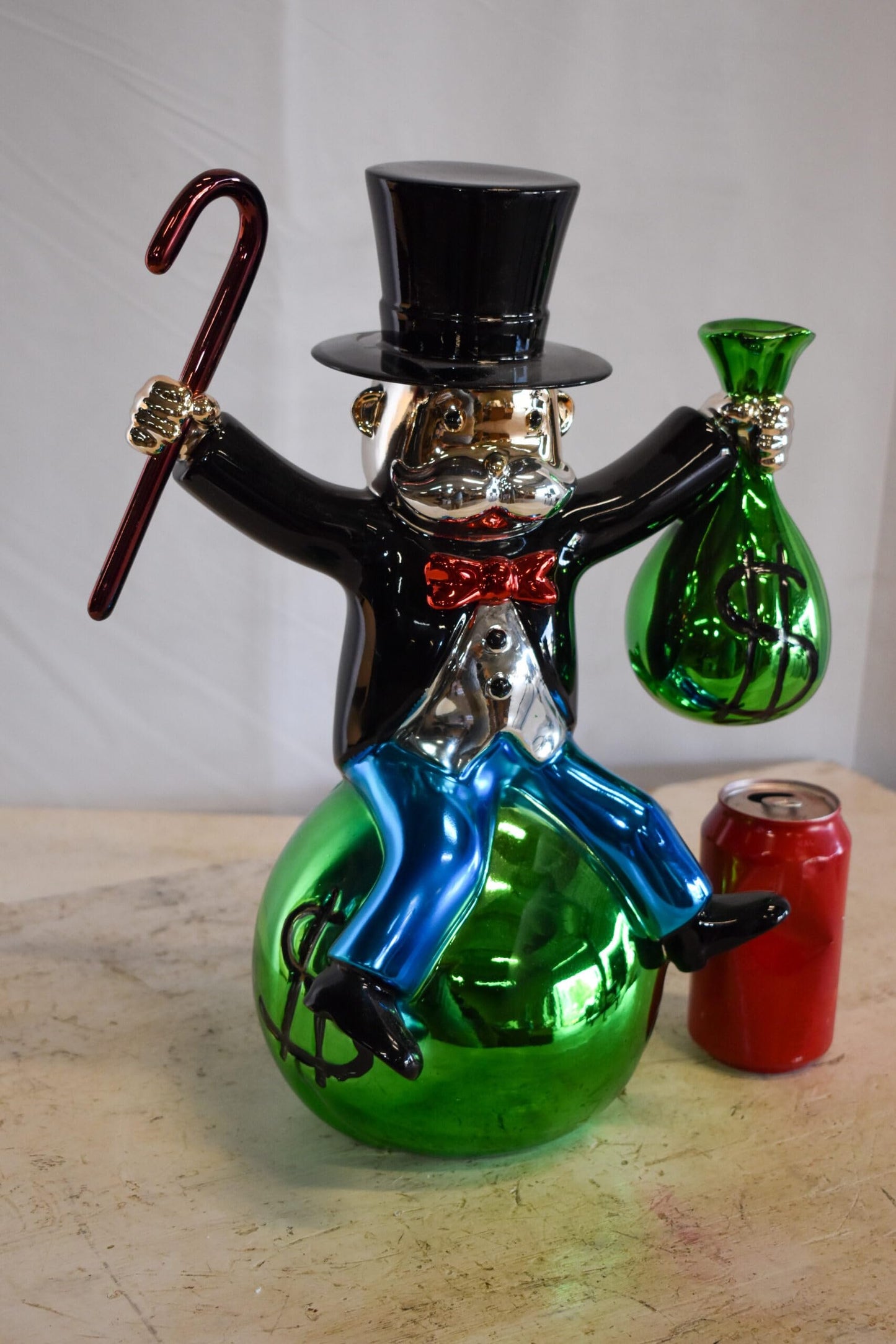 Joyous Monopoly Man Sitting on Money Bag Resin Statue 12" x 10" x 16"H