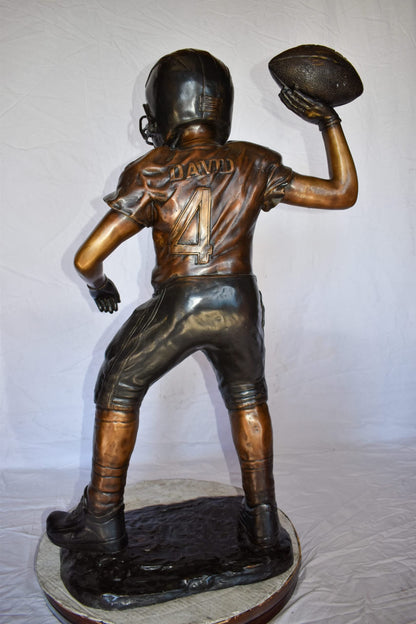 Young Boy Playing Football Bronze Statue Size: 26" x 14" x 43"H