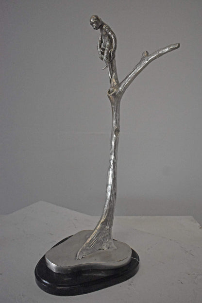Monkey Resting on a Tree Silver Finish Bronze Statue - Size: 12" x 13" x 27"H.
