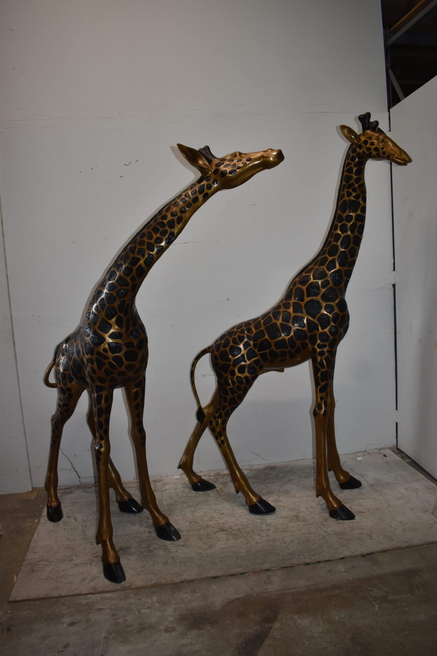 Pair of Young Playful Giraffes Bronze Statue Size: 54" x 18" x 89"H