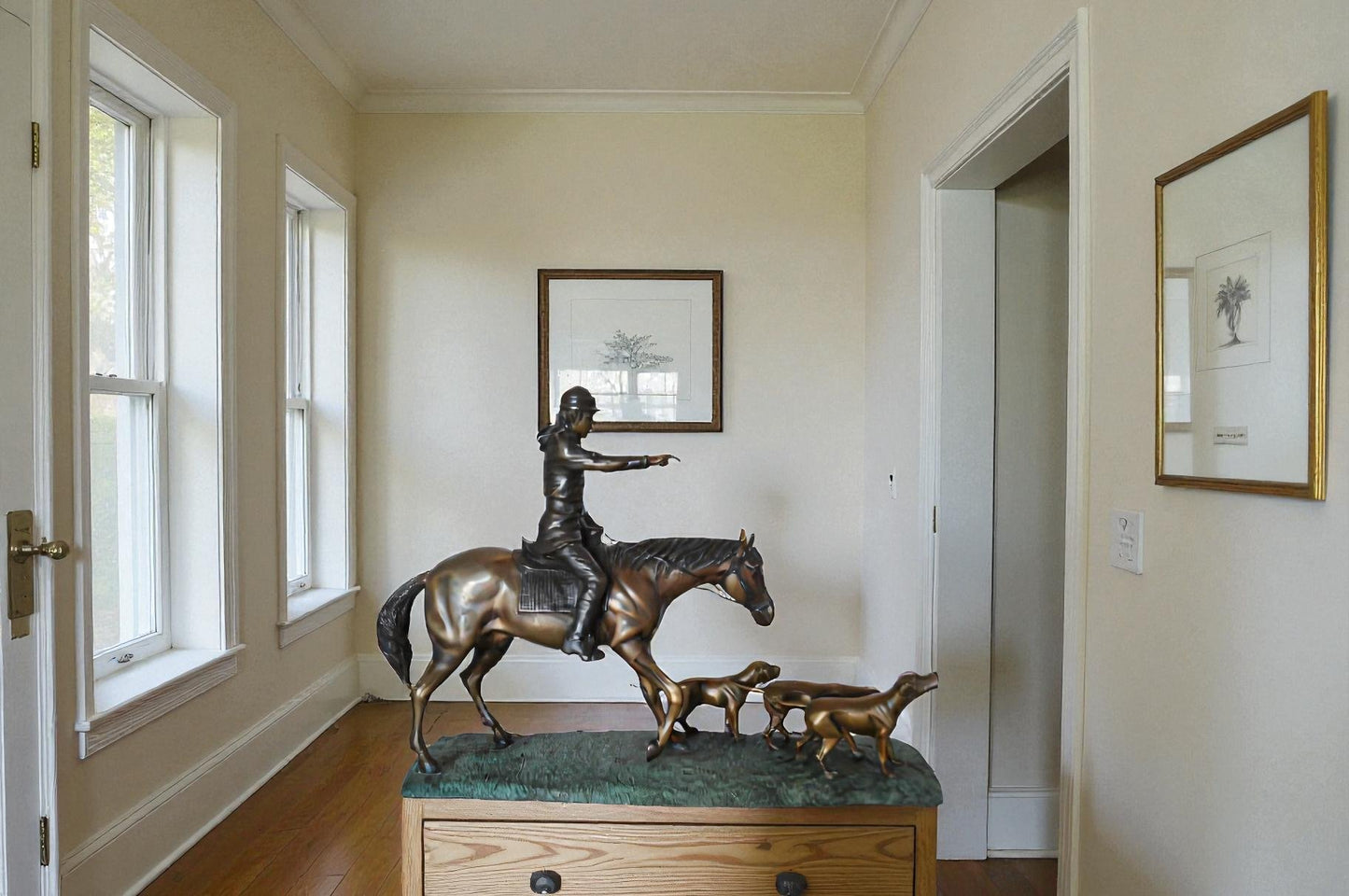 Hunter with three dogs Bronze Statue -  Size: 27"L x 6"W x 18"H.