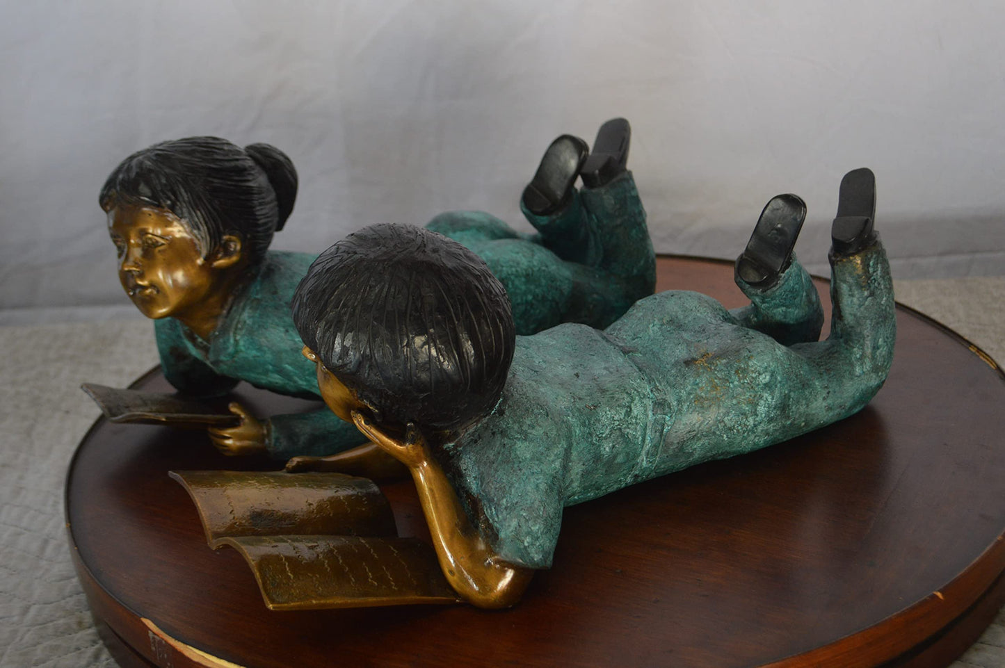 Set of a Boy and a Girl Reading a Book Bronze Statue -  Size: 16"L x 7"W x 8"H.