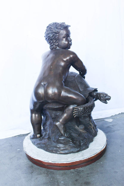 Naked toddler on turtle bronze statue Art Nude -  Size: 23"L x 26"W x 34"H.