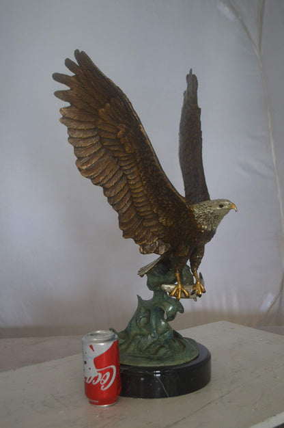 Eagle Catching His Prey from Water Bronze Statue -  Size: 14"L x 13"W x 26"H.